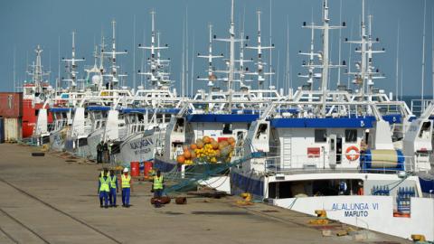 Security guards patrol past the EMATUM fishing fleet docked in Maputo, Mozambique, May 3, 2016. PHOTO BY REUTERS/Grant Lee Neuenburg