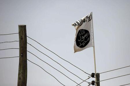 A Boko Haram flag flies in Damasak, March 24, 2015. PHOTO BY REUTERS/Joe Penney