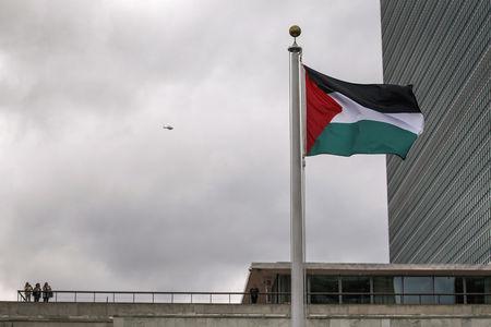 The Palestinian flag flies after being raised by Palestinian President Mahmoud Abbas in a ceremony outside the United Nations during the 70th session of the U. N. General Assembly in New York, September 30, 2015. PHOTO BY REUTERS/Carlo Allegri