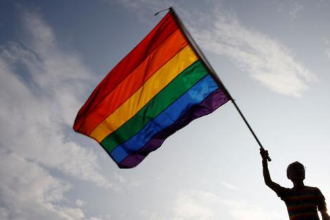 Gay rights activist Chi Chia-wei waves a rainbow flag during a rally to support the upcoming same-sex marriage referendum, in Taipei, Taiwan, November 18, 2018. PHOTO BY REUTERS/Tyrone Siu