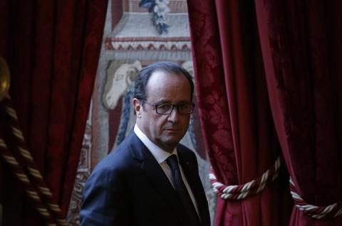 French President Francois Hollande arrives to address journalists after a meeting at the Elysee Palace in Paris, September 9, 2014. PHOTO BY REUTERS/Christian Hartmann