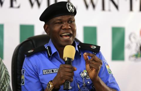 Frank Mba, Nigeria's police force public relation officer, answers questions during a news conference in response to Wednesday's bomb attack on a crowded central shopping district and other security related issues at the national briefing centre in Abuja