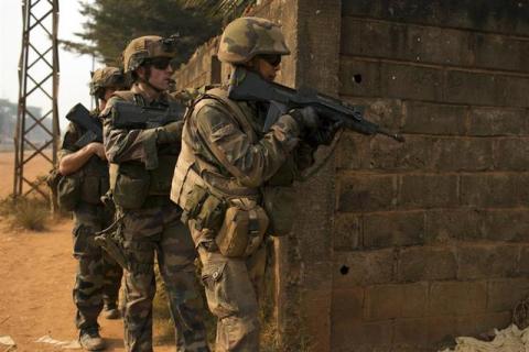 French peacekeeping soldiers patrol a street of the capital Bangui