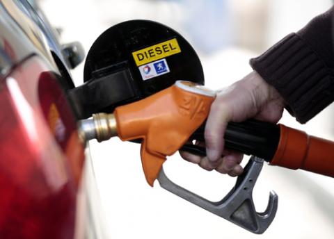 A customer fills-up his car with diesel at a gas station in Nice, March 4, 2013. PHOTO BY REUTERS/Eric Gaillard