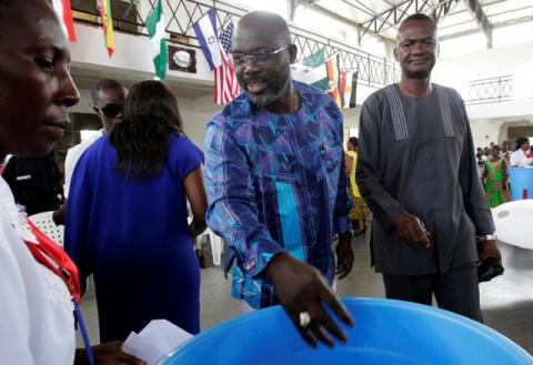 George Weah, former soccer player and presidential candidate of Congress for Democratic Change (CDC), is pictured at a church in Monrovia, Liberia, October 8, 2017. PHOTO BY REUTERS/Thierry Gouegnon