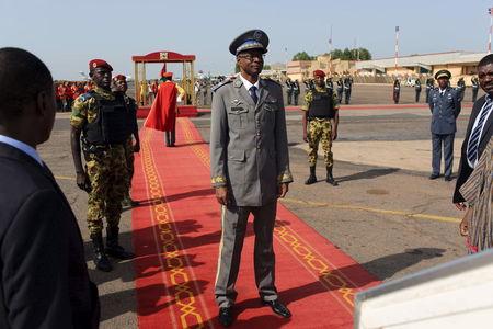 Burkina Faso's coup leader General Gilbert Diendere awaits the arrival of Niger's President Mahamadou Issoufou at the airport in Ouagadougou, Burkina Faso, September 23, 2015. PHOTO BY REUTERS/Joe Penney