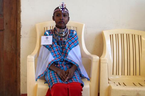 A Maasai girl waits for the start of a social event advocating against harmful practices such as Female Genital Mutilation (FGM) at the Imbirikani Girls High School in Imbirikani, Kenya, April 21, 2016. PHOTO BY REUTERS/Siegfried Modola