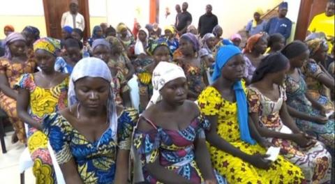 A still image taken from video shows a group of girls, released by Boko Haram jihadists after kidnapping them in 2014 in the north Nigerian town of Chibok, sitting in a hall as they are welcomed by officials in Abuja, Nigeria, May 7, 2017. PHOTO BY REUTERS