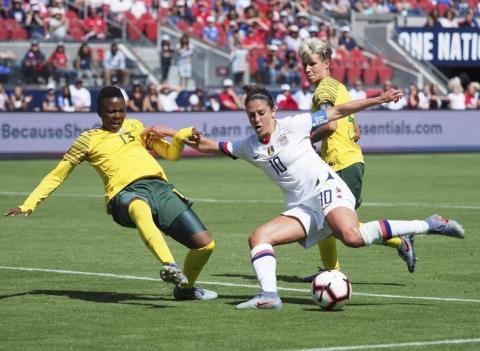 USA forward Carli Lloyd (10) scores a goal against South Africa defender Bambanani Mbane (13) during the second half during a Countdown to the Cup Women's Soccer match at Levi's Stadium. PHOTO BY REUTERS/Kelley L Cox-USA TODAY Sports