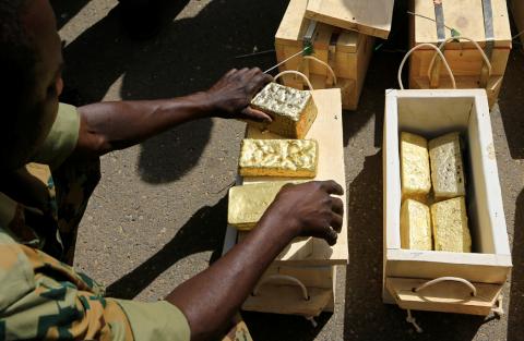 Sudanese Rapid Support Forces (RSF) display gold bars seized from a plane that landed at Khartoum Airport in an investigation into possible smuggling, in Khartoum, Sudan May 9, 2019. PHOTO BY REUTERS/Mohamed Nureldin Abdallah