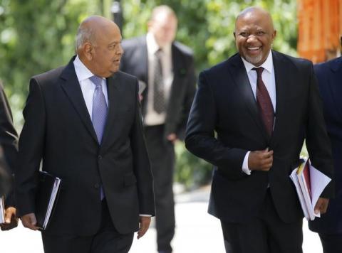 South Africa's Deputy Finance Minister Mcebisi Jonas (R) arrives with Finance Minister Pravin Gordhan for Gordhan's 2016 Budget address in Cape Town, February 24, 2016.PHOTO BY REUTERS