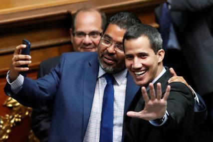 Venezuelan opposition leader and self-proclaimed interim president Juan Guaido gestures as he attends a session of the Venezuela's National Assembly in Caracas, Venezuela, January 29, 2019. PHOTO BY REUTERS/Carlos Garcia Rawlins