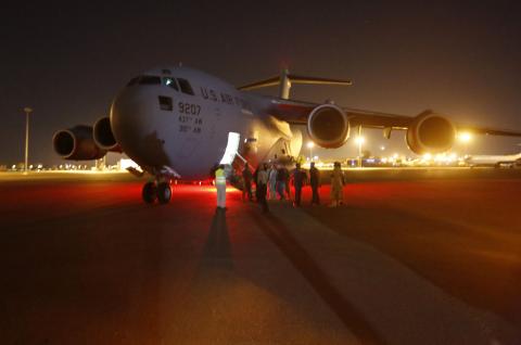 A U.S. Air Force plane carrying two Sudanese detainees released from the Guantanomo facility from Guantanamo in Cuba, arrives at Khartoum Airport early