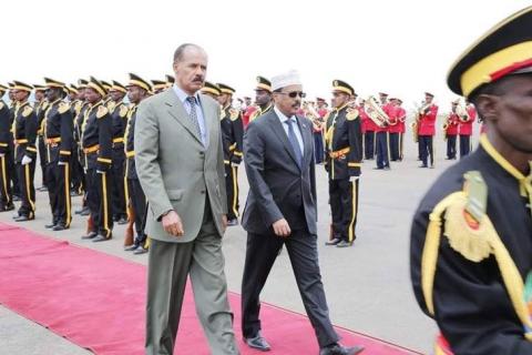 Eritrea's President Isaias Afwerki (L) walks besides the Somalia's President Mohamed Abdullahi Mohamed during a welcoming ceremony upon his arrival for a three-day visit to Eritrea, in Asmara, Eritrea July 28, 2018. PHOTO BY REUTERS/Courtesy of the office of President of the Republic of Somalia