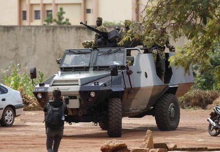 Presidential guard soldiers are seen on an armoured vehicle at Laico hotel in Ouagadougou, Burkina Faso, September 20, 2015. PHOTO BY REUTERS/Joe Penney