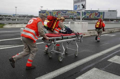 A medical gurney is wheeled into Orly airport southern terminal after a shooting incident near Paris, France, March 18, 2017. PHOTO BY REUTERS/Christian Hartmann