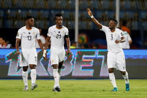 Ghana's Asamoah Gyan celebrates after Tunisia's Rami Bedoui scored an own goal and the first for Ghana. PHOTO BY REUTERS/Amr Abdallah Dalsh