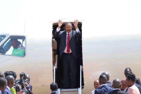 Sudan's prime minister Abdalla Hamdok waves as he arrives for meetings with Sudan's ruling council and rebel leaders for a roadmap for peace talks, at the Juba international airport in Juba, South Sudan, September 12, 2019.REUTERS/Samir Bol