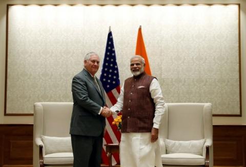 U.S. Secretary of State Rex Tillerson shakes hands with Indian Prime Minister Narendra Modi before their meeting at the Prime Minister's residence in New Delhi, India, October 25, 2017. PHOTO BY REUTERS/Alex Brandon