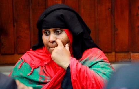 Haniya Said Saagar, a widow of a slain Muslim cleric Sheikh Aboud Rogo, sits in the dock inside Law court after she was arrested over the foiled attack on the Central police station in the coastal city of Mombasa, Kenya, September 15, 2016. PHOTO BY REUTERS/Joseph Okanga