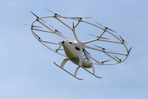 A prototype of an electrical air taxi that takes off and lands vertically (eVTOLs), made by German startup Volocopter, flies during a demonstration round at the Daimler museum in Stuttgart, Germany, September 14, 2019. PHOTO BY REUTERS/Michael Dalder