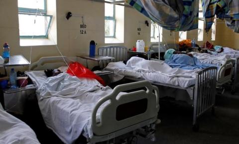 Cholera patients receive treatment and care inside a special ward at the Kenyatta National Hospital in Nairobi, Kenya, July 19, 2017. PHOTO BY REUTERS/Thomas Mukoya