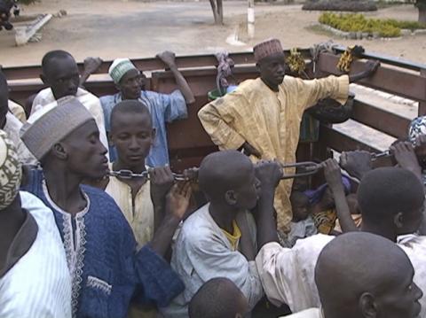Former Nigerian hostages held by Boko Haram who were freed by the Cameroonian military arrive in Maroua, Cameroon, in this still image taken from a December 5, 2015 video footage. PHOTO BY REUTERS/Reuters TV