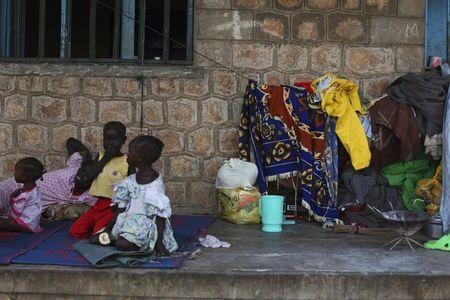 South Sudanese internally displaced persons lie on a floor of a school building where people from five different tribes found shelter, in Juba, June 15, 2014. PHPTO BY REUTERS/Andreea Campeanu