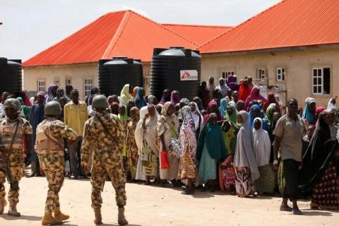 Security officers are seen at the Bakkasi camp for internally displaced people, after security was called to control some refugees, who rallied against camp authorities for what they say is poor distribution of food rations, in Borno, Nigeria, August 29, 2016. PHOTO BY REUTERS/Afolabi Sotunde