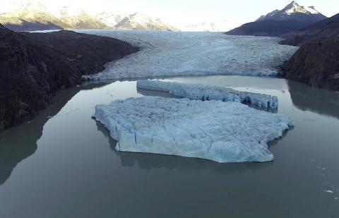 Two new icebergs are seen after breaking off from the Grey glacier in Patagonia, Chile, March 9, 2019. PHOTO BY REUTERS/Ricardo Jana/Courtesy of Chilean Antarctic Institute (INACH