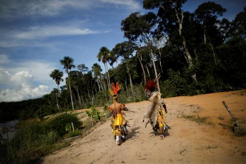 Indigenous people of the Pareci community walk in the village of Wazare near the town of Campo Novo do Parecis, Brazil, April 26, 2018. PHOTO BY REUTERS/Ueslei Marcelino 