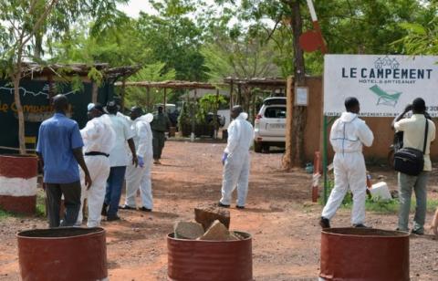 Malian investigators walk at the entrance of the Kangaba tourist resort following an attack where gunmen stormed Le Campement Kangaba in Dougourakoro, to the east of the capital Bamako, Mali, June 19, 2017. PHOTO BY REUTERS/ Stringer