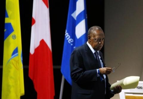 Issa Hayatou walks back to his seat after an address during the Extraordinary FIFA Congress in Zurich, Switzerland, February 26, 2016. PHOTO BY REUTERS/Ruben Sprich