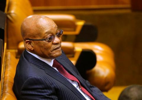 President Jacob Zuma looks on as members of Julius Malema's Economic Freedom Fighters (EFF) party raise objections before being evicted from Parliament in Cape Town, South Africa, May 17, 2016. PHOTO BY REUTERS/Mike Hutchings