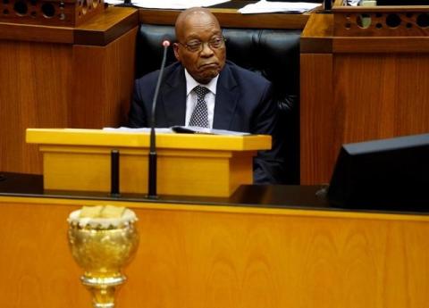 President Jacob Zuma looks on as members of Julius Malema's Economic Freedom Fighters (EFF) party raise objections during Zuma's question and answer session in Parliament in Cape Town, South Africa, September 13, 2016. PHOTO BY REUTERS/Mike Hutchings