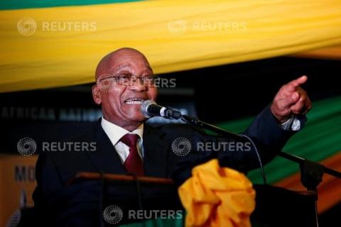 South African President Jacob Zuma sings at the City Hall in Pietermaritzburg, South Africa, November 18, 2016. PHOTO BY REUTERS/Rogan Ward