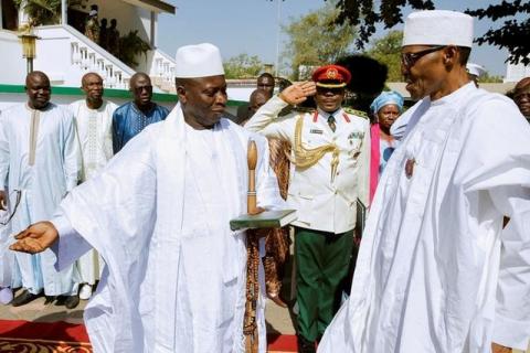 Gambia's President Yahya Jammeh welcomes Nigeria's President Muhammadu Buhari in Banjul, Gambia, January 13, 2017. PHOTO BY REUTERS/Stringer