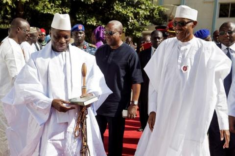 Gambia's President Yahya Jammeh receives Nigeria's President Muhammadu Buhari in Banjul, Gambia, January 13, 2017. PHOTO BY REUTERS/Stringer