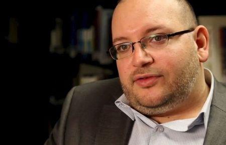 Washington Post reporter Jason Rezaian speaks in the newspaper's offices in Washington, DC in a November 6, 2013 file photo provided by The Washington Post. PHOTO BY REUTERS/Zoeann Murphy