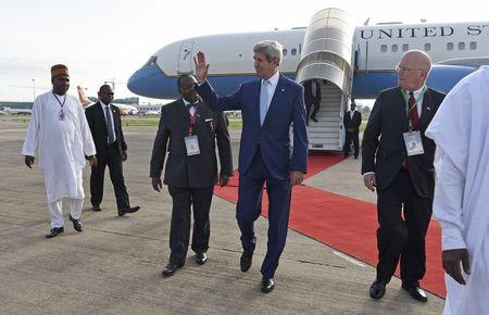 Secretary of State John Kerry waves as he arrives at Nnamdi Azikiwe International Airport in Abuja, Nigeria, May 29, 2015. PHOTO BY REUTERS/Susan Walsh