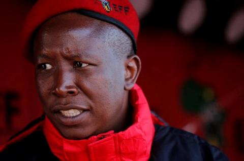 Julius Malema, the firebrand leader of South Africa's Economic Freedom Fighters (EFF) looks on before addressing his supporters during his campaign, ahead of the August 3 local government elections, in Etwatwa, a township near Benoni, South Africa. July 27,2016. PHOTO BY REUTERS/Siphiwe Sibeko