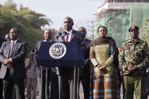 Kenya's Interior Minister Joseph ole Lenku (C), flanked other government officials, speaks during a news conference near the Westgate shopping mall