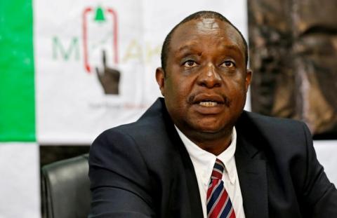 Kenya's Cabinet Secretary of National Treasury Henry Rotich speaks at the launch of the first mobile-phone-based government bond at the Treasury building in Nairobi, Kenya, March 23, 2017. PHOTO BY REUTERS/Thomas Mukoya