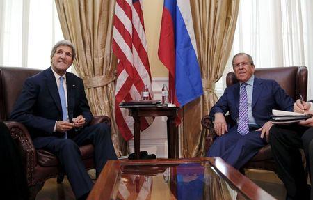 U.S. Secretary of State John Kerry (L) meets with Russian Foreign Minister Sergey Lavrov at a hotel in Vienna, Austria June 30, 2015. PHOTO BY REUTERS/Carlos Barria