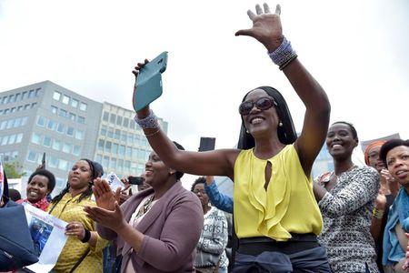 Singer Khadja Nin (R) takes part in a protest against Burundi President Pierre Nkurunziza and his bid for a third term, in Brussels, Belgium, May 23, 2015. PHOTO BY REUTERS/Eric Vidal