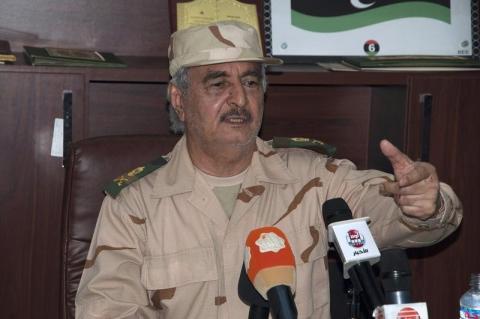 Ex-general Khalifa Haftar speaks during a news conference after surviving an assassination attempt, in Al Marj, east of Benghazi, June 4, 2014. PHOTO BY REUTERS/Stringer