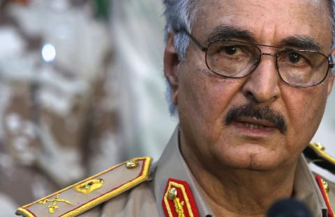 Then-General Khalifa Haftar speaks during a news conference at a sports club in Abyar, east of Benghazi, May 21, 2014. PHOTO BY REUTERS/Esam Omran Al-Fetori