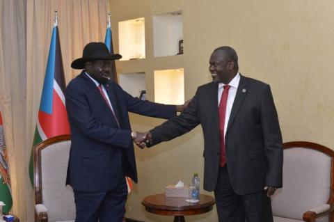 South Sudan's President Salva Kiir Mayardit (L) and Riek Machar, former vice president and rebel leader, shake hands after their meeting in which they have reached a deal to form a long-delayed unity government in Juba, South Sudan, December 17, 2019. PHOTO BY REUTERS/Jok Solomun