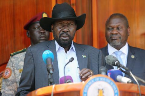 South Sudan's President Salva Kiir Mayardit flanked by ex-vice President and former rebel leader Riek Machar address a news conference at the State House in Juba, South Sudan, February 20, 2020. PHOTO BY REUTERS/Jok Solomun