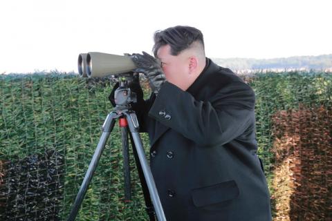 North Korean leader Kim Jong Un attends the test-fire of an anti-tank guided weapon in this undated photo released by North Korea's Korean Central News Agency (KCNA) in Pyongyang, February 27, 2015. PHOTO BY REUTERS/KCNA